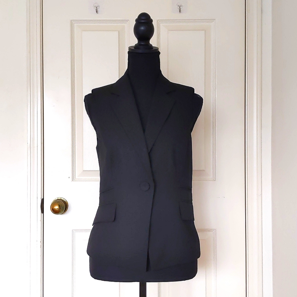 NWT. The Limited Fully lined sleeveless blazer vest with real pockets.